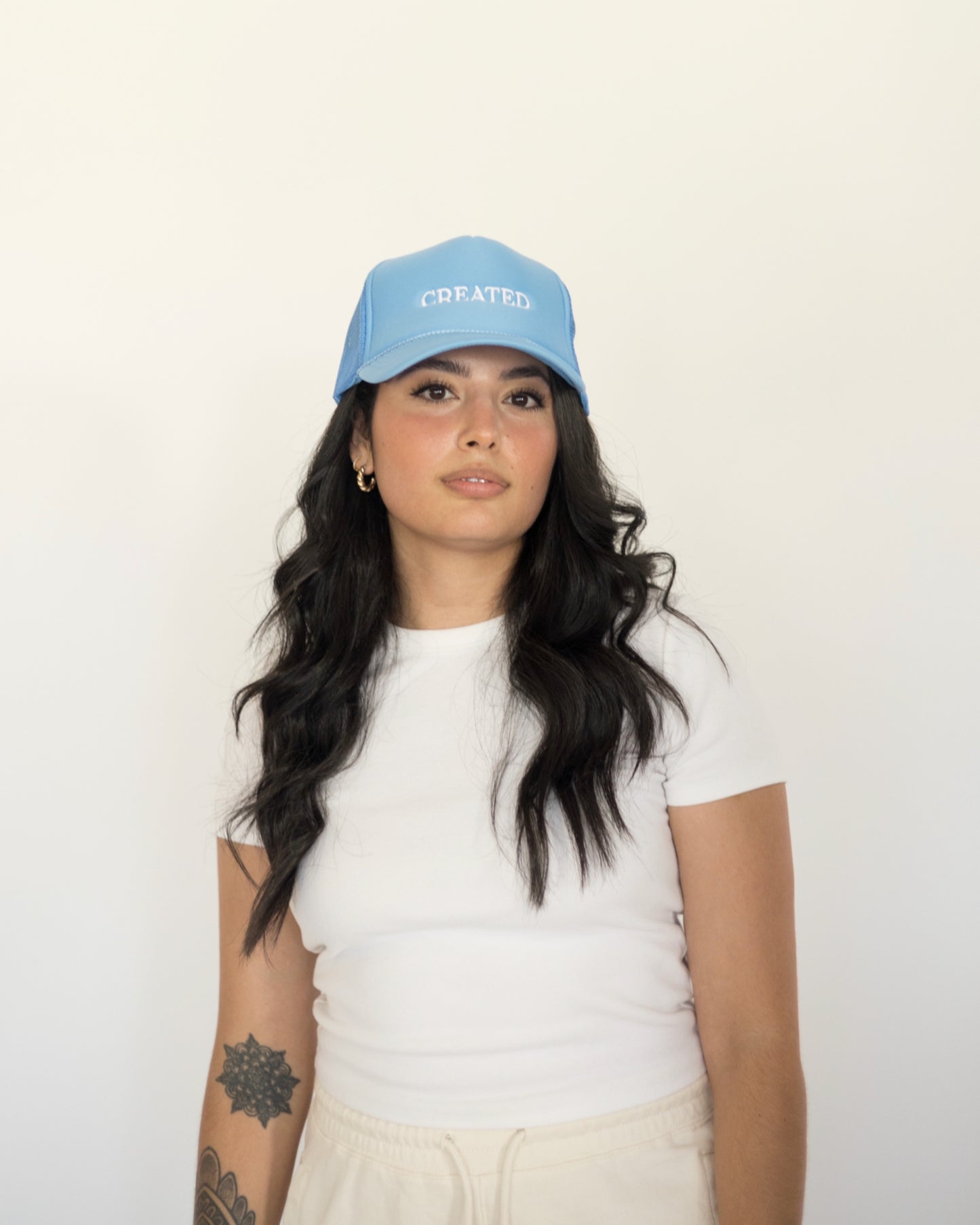 'CREATED' trucker hat - columbia blue